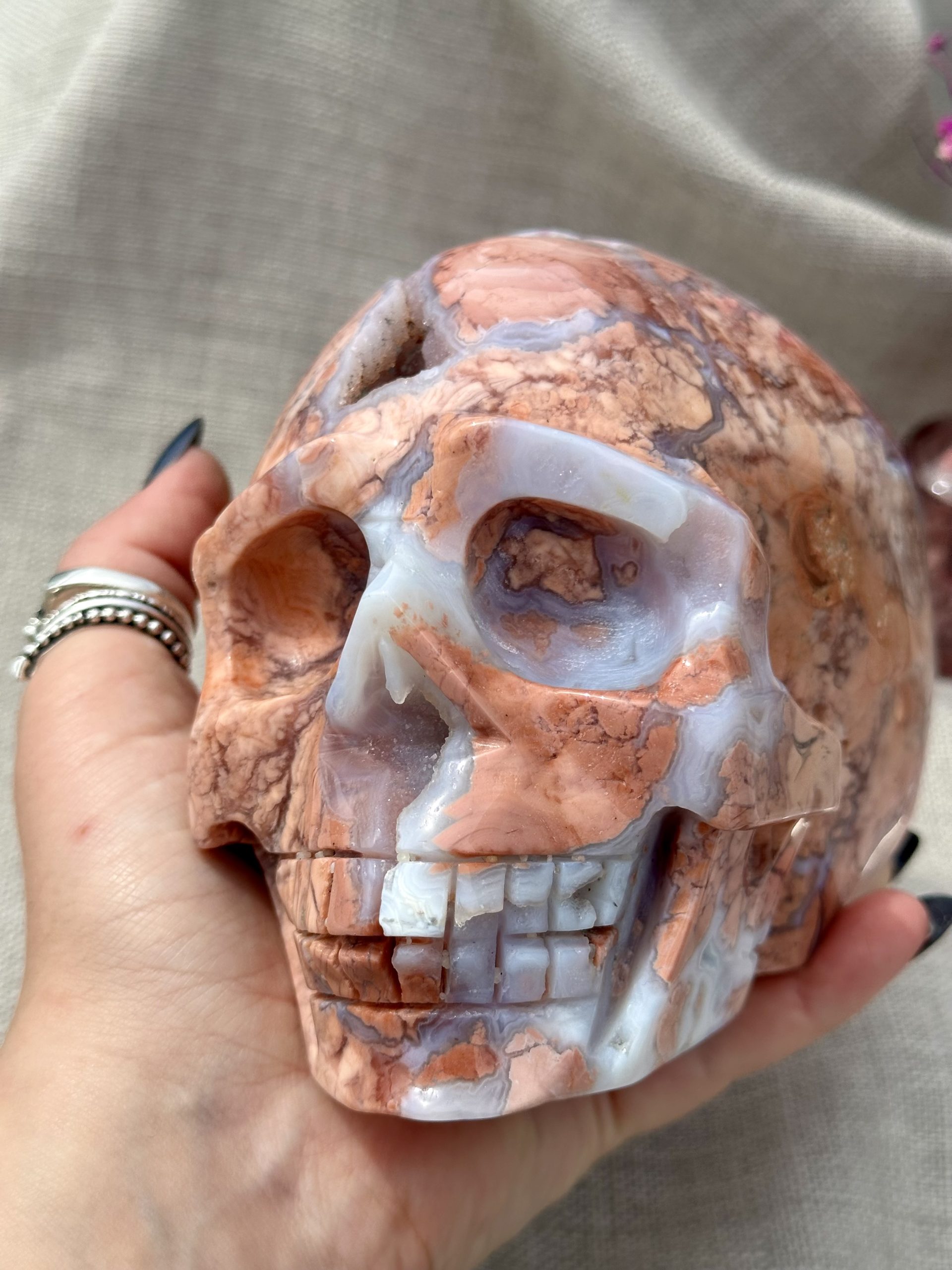 Won Pink Agate Carved Crystal Skull